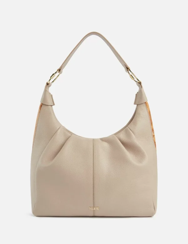 Universe Leather, cante krahu bezhe